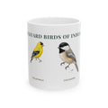 Backyard Birds of Indiana ceramic mug with labeled illustrations of American Goldfinch, Black-capped Chickadee, Northern Cardinal and Eastern Bluebird