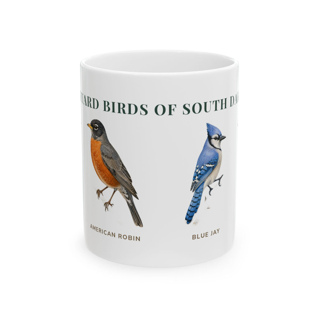 Backyard Birds of South Dakota ceramic mug with labeled American Robin and Blue Jay illustrations