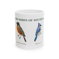 Backyard Birds of South Dakota ceramic mug with labeled American Robin and Blue Jay illustrations