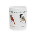 Backyard Birds of Michigan ceramic mug with labeled illustrations of Northern Cardinal, Black-capped Chickadee, American Goldfinch and American Robin